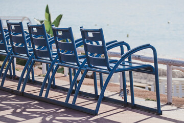 Famous blue chairs on the Promenade des Anglais in Nice © Andrei Antipov