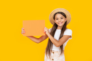 cheerful teen girl with copy space on orange paper on yellow background