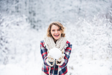 Exciting winter photoshoot ideas. Snowflakes are tiny crystals. Snow games. Winter outfit. Snow makes everything outdoors look amazing. Woman warm clothes snowy forest. Nature covered snow. Happiness