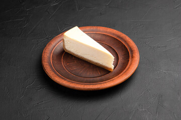 Cheesecake, sweet cheesecakes with different flavors on a black background