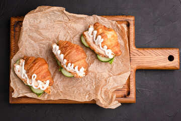 Croissants with fillings, croissants with different fillings on a black background