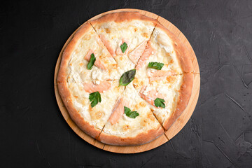 Pizza, different pizzas with different fillings on a black background