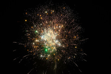 Bright and colorful fireworks at a black night sky