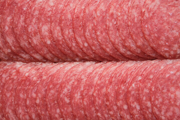 Chopped salami sausage, top view, flat lay.