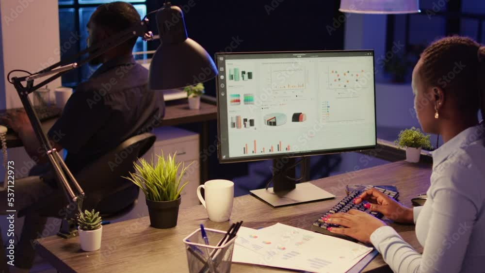 Poster office worker analyzing research data on computer network, using online information to create busine