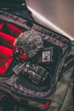 Vertical shot of fujifilm xt3 camera equipment and a Rode mic in a camera bag