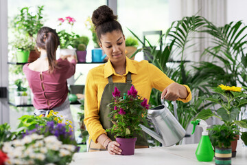 Young florists working together at the shop