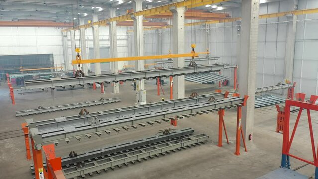 Aerial video, drone footage of galvanize and zinc coating production process and metalwork with cranes and lifts