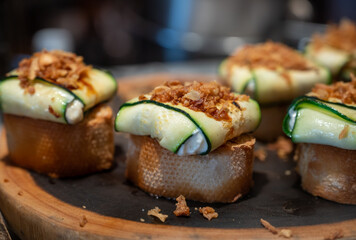 Typical snack of Basque Country and Navarre, pinchos or pinxtos served in bar, small slices of bread upon which ingredient or mixture of ingredients is placed, San Sebastian, Spain