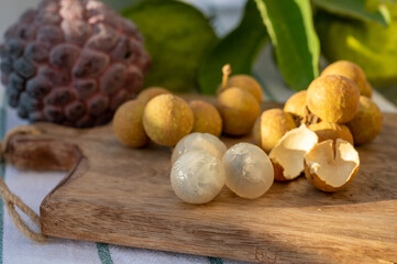 Tasty tropical exotic fruits, ripe fresh peeled lychee fruits