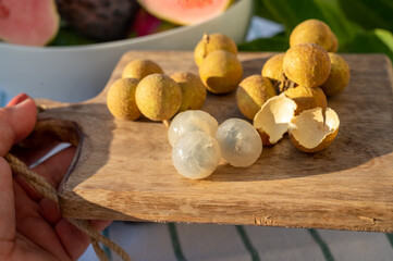 Tasty tropical exotic fruits, ripe fresh peeled lychee fruits
