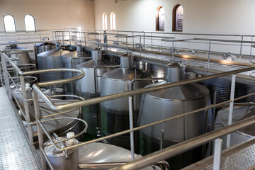 Metallic cisterns for processing and fermentating wine in fabric shop