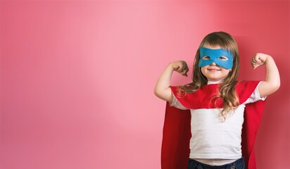Emotional child superhero in flying gesture wears costume
