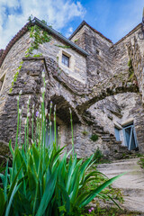Obraz premium View on the beautiful stone facades and medieval houses of the small historical village of Rochecolombe in the South of France (Ardeche)