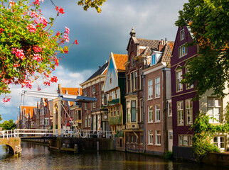 Historic old town of Alkmaar, North Holland, with typical canal and houses. Netherlands