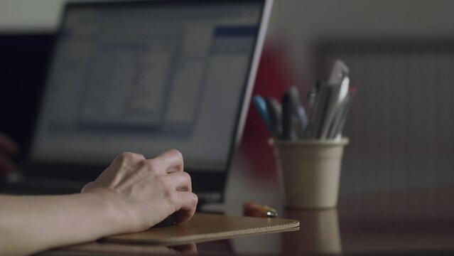 Analyst Working With Spreadsheet Business Data On Computer, closeup of female hands using mouse. 