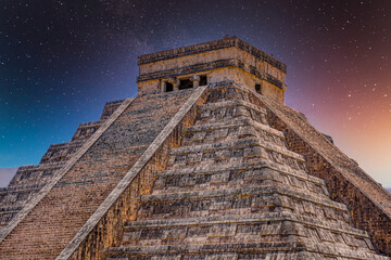 Temple Pyramid of Kukulcan El Castillo, Chichen Itza, Yucatan, Mexico, Maya civilization with Milky Way Galaxy stars night sky