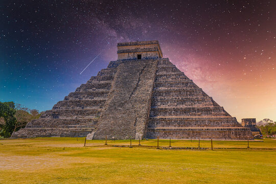 Temple Pyramid of Kukulcan El Castillo, Chichen Itza, Yucatan, Mexico, Maya civilization with Milky Way Galaxy stars night sky