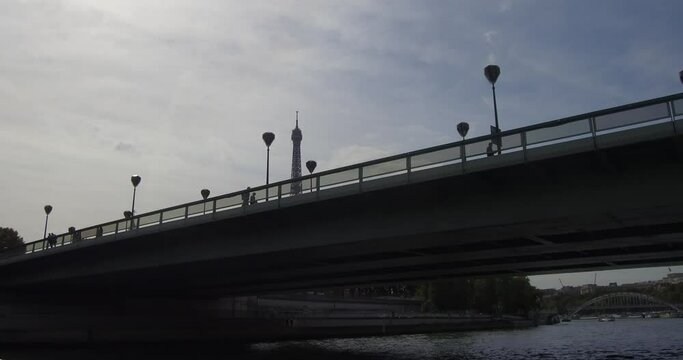 Passing under the Pont de l'Alma in Paris