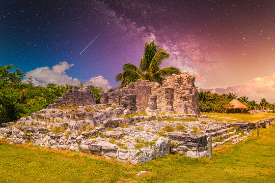Ancient ruins of Maya in El Rey Archaeological Zone near Cancun, Yukatan, Mexico with Milky Way Galaxy stars night sky