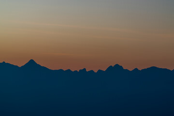 Background of colorful sky concept: Dramatic sunset with twilight color sky and clouds