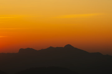 Background of colorful sky concept: Dramatic sunset with twilight color sky and clouds