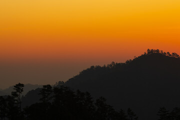 Background of colorful sky concept: Dramatic sunset with twilight color sky and clouds