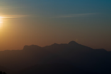 Background of colorful sky concept: Dramatic sunset with twilight color sky and clouds