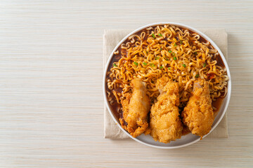 Korean instant noodles with fried chicken or Fried chicken ramyeon