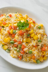 fried rice with mixed vegetable (carrot, green bean peas, corn) and egg