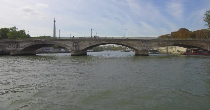 Passing under the Pont des Invalides in Paris
