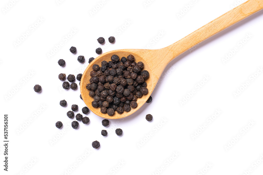 Sticker Black peppercorns (black pepper) in wooden spoon isolated on white background. Top view, flat lay.