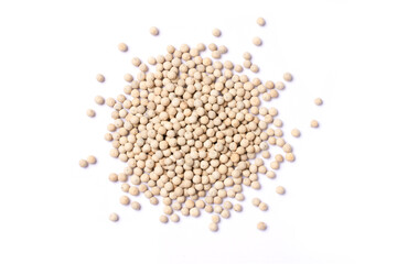 White pepper seeds (peppercorns) isolated on white background, top view, flat lay.