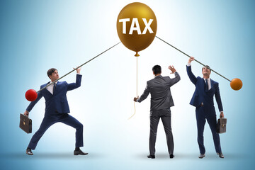 Businessman in tax balloon concept