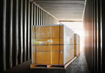 Package Boxes Stacked on Pallets Inside Cargo Container. Shipment Loading Trucks. Shipping Supplies Goods. Freight Truck Transport. Logistics