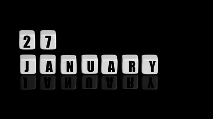 January 27th. Day 27 of month, Calendar date. White cubes with text on black background with reflection.Winter month, day of year concept