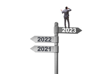 Businessman on signpost from 2022 to 2023