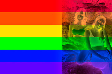 Top vive a rainbow flag background. LGBT, Rainbow gay pride flag. Symbol of LGBT movement. 