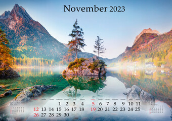 Horizontal wall calendar for 2023 year. November, B3 size. Set of calendars with amazing landscapes. Hochkalter peak reflected in Hintersee lake, Germany. Monthly calendar ready for print..