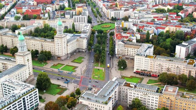 Aerial drone view of Schoneberg, Berlin, Germany. Residential district with greenery, office and residential buildings, roads with moving cars