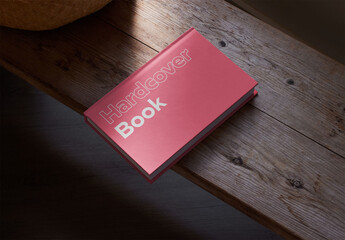 Hardcover Book Mockup With Natural Light on a Wood Table