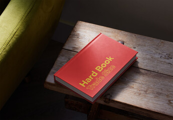 Trade Size Hardcover Book Mockup on a Wood Table