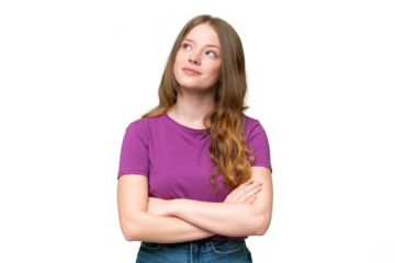 Young pretty woman over isolated background looking up while smiling