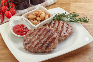 Grilled beef burger cutlet with sauce
