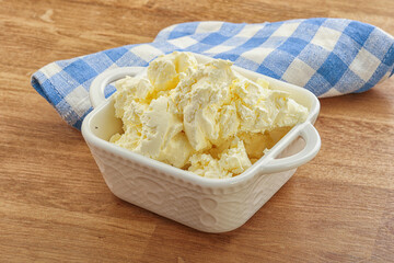 Italian soft mascarpone cheese in the bowl