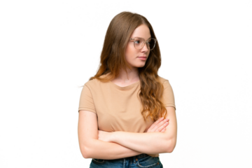 Young pretty woman over isolated background keeping the arms crossed