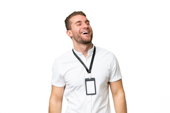 Young caucasian man with ID card isolated on green chroma background laughing