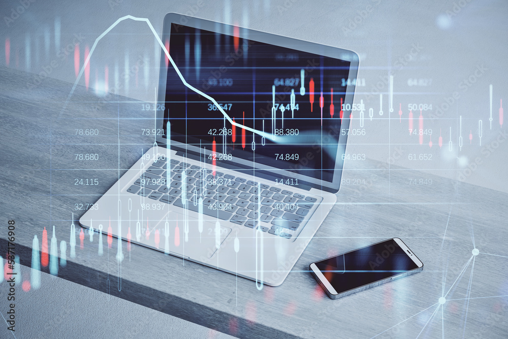 Poster close up of laptop and smartphone on wooden desktop with glowing candlestick forex chart and map hol