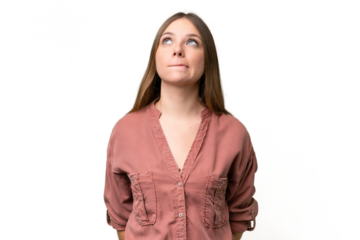 Young beautiful blonde woman over isolated background and looking up