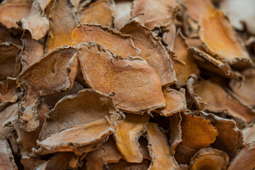 Details of pieces of raw temulawak empon-empon dried in the sun before being processed. Temulawak is a medicinal plant originating from the island of Java, Indonesia